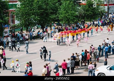 VICHUGA, RUSSIA - JUNE 11, 2016: A crowd of people walking down the street in celebration of the city day Vichuga, Russia Stock Photo