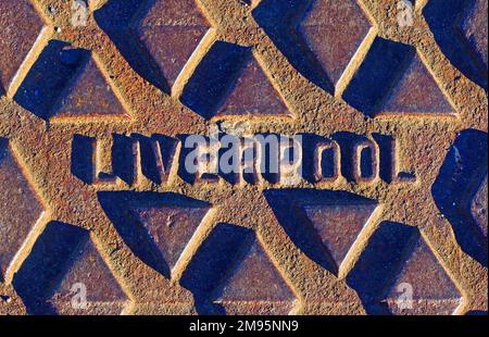 Rusty Liverpool embossed cast iron street grid, Merseyside, England, UK, L1 2SF Stock Photo