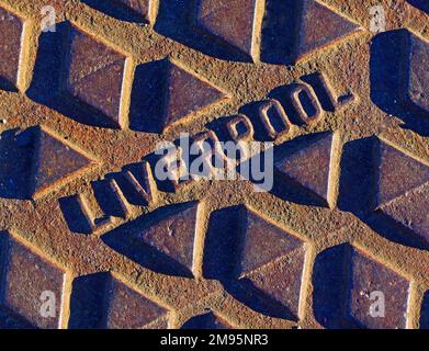 Rusty Liverpool embossed cast iron street grid, Merseyside, England, UK, L1 2SF Stock Photo