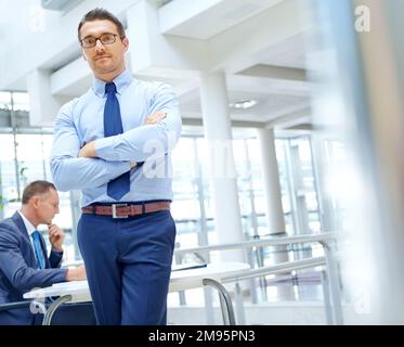 Portrait, ceo and expert with a business man in his office standing arms crossed in a confident pose. Mission, mindset and management with a male Stock Photo