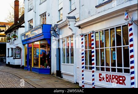 Barbers schoolwear store and The Antelope Pub, Church Square, High Wycombe, Buckinghamshire, England Stock Photo