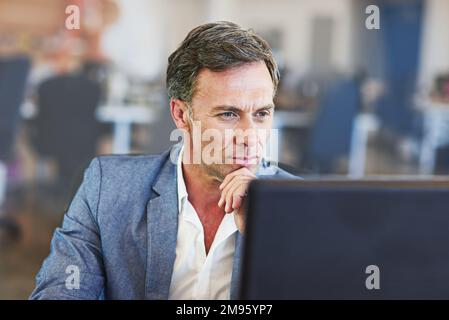 Senior businessman, reading online report and pc for web design planning, networking or digital marketing. Mature man, thinking and tech strategy Stock Photo
