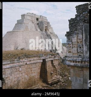 the TEMPLE OF THE MAGICIAN in the ancient Mayan city of Uxmal, Yucatan. This pyramid was built around the 10th century at the end of the Classical Maya period. Stock Photo