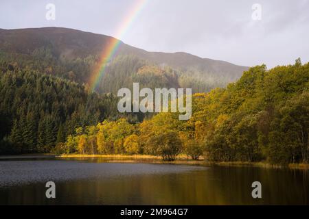 Rainbow over Loch Chon, Loch Lomond and Trossachs National Park, Scotland Stock Photo