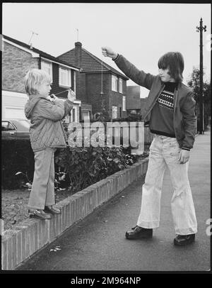 Two boys playing a game of conkers. Stock Photo