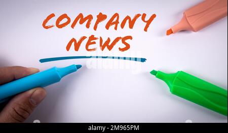Company News. Text and colored markers on a white background. Stock Photo