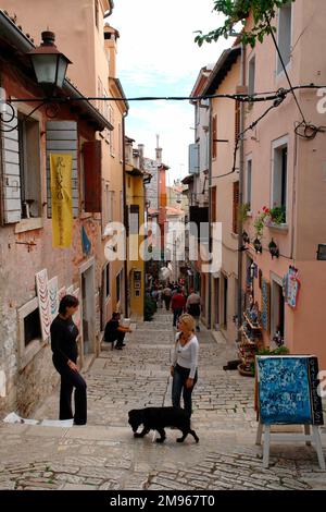 A narrow street in the old part of Rovinj, on the western coast of Istria, Croatia. Stock Photo