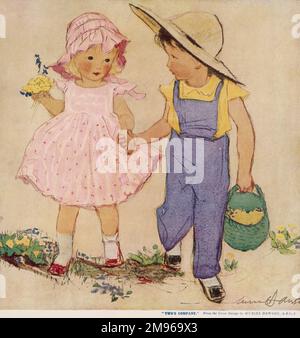 A little boy in blue dungarees and a wide brimmed sun hat, holds hands with a little girl wearing a pink dress and bonnet as they walk together picking flowers. Stock Photo