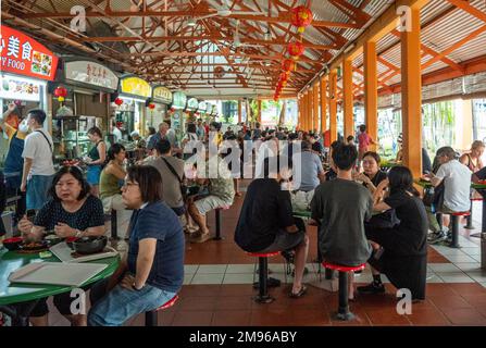 Maxwell Food Centre busy with people having lunch Tanjong Pagar Singapore Stock Photo