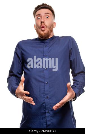 Attractive young man wearing blue shirt, isolated over a white background. Stock Photo