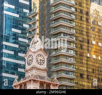 Lau Pa Sat clock tower and high rise residential towers Singapore Stock Photo