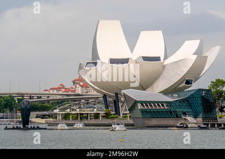 ArtScience Museum and Louis Vuitton Store on the water at Marina Bay Sands Singapore. Stock Photo