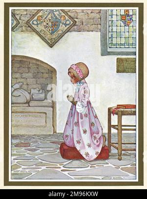 A little girl praying in a church near a stone effigy. Stock Photo