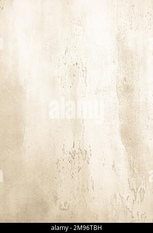 Beige textured concrete background with light base darker in the recesses. Abstract texture for graphic design or wallpaper, toned, top view, vertical Stock Photo
