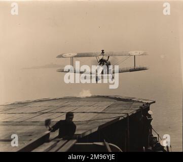 A Sopwith 2F1 Camel takes-off from HMS Pegasus. Stock Photo