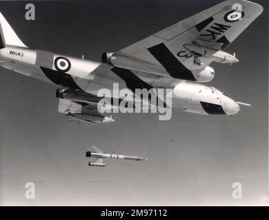 English Electric Canberra TT18, WK143, with a Flight Refuelling multi-flare target. Stock Photo