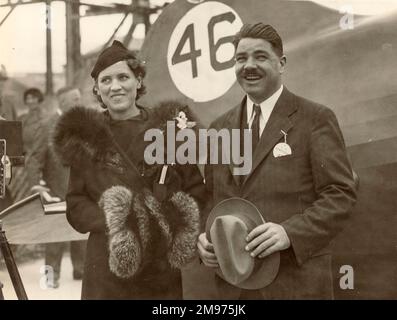 Jacqueline Cochran, 1906-1980, and Wesley Smith alongside their Gee Bee QED in the 1934 MacRobertson Trophy Air Race. Stock Photo