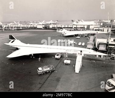 A pair of British Airways Concordes (including G-BOAA) on the tarmac at Heathrow Airport. Stock Photo