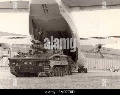 An Abbot 105mm self-propelled gun being driven off a RAF Short SC-5 Belfast CMk1 of No53 Squadron. Stock Photo