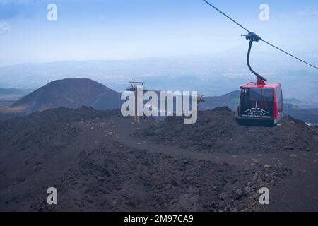 Cable car up Mount Etna, volcano, Sicily, dormant craters in background Stock Photo
