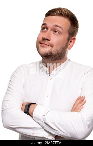 Close up horizontal portrait of a handsome man with a beard, stylish haircut, wearing a white shirt, isolated on a white background Stock Photo
