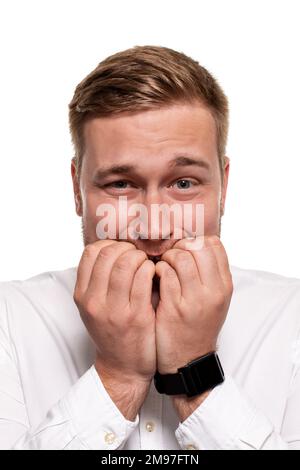Close up horizontal portrait of a handsome man with a beard, stylish haircut, wearing a white shirt, isolated on a white background Stock Photo