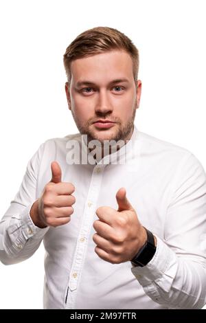 Close up horizontal portrait of a handsome man with a beard, stylish haircut, wearing a white shirt, isolated on a white background Stock Photo