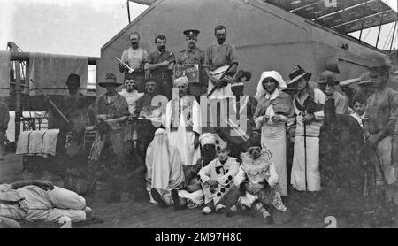 People in fancy dress on the deck of a ship. Stock Photo