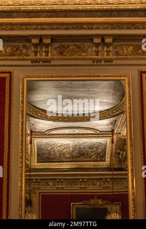 Versailles, France - Dec. 28 2022: Decorative ceiling reflecting in the hall of mirror in Versailles palace Stock Photo