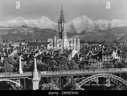 A panoramic view of Bern, Switzerland - with the snow-capped peaks of the Alps in the background. Stock Photo