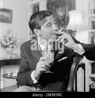 Advertisement for Life cigarettes -- male model (Peter Anthony) posing in a luxury interior. Stock Photo