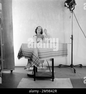 Advertisement for Nescafe -- little girl (Caroline Ellis) sitting at a