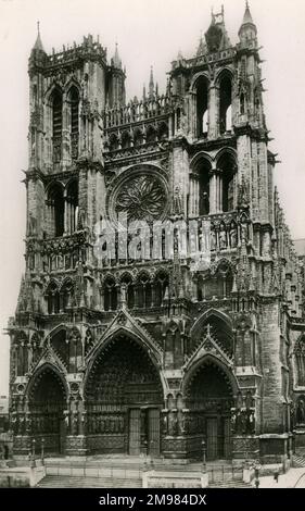 Somme, France - The Amiens Cathedral, The Cathedral Basilica of Our Lady of Amiens, is the tallest complete cathedral in France and sits overlooking the Amiens River in the Somme region. It is known as an example of quality 13th century Gothic architecture. Stock Photo