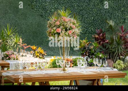 Elegant table decoration, for a social event in an outdoor garden Stock Photo