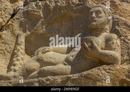 BISOTUN, IRAN - JULY 13, 2019: Ancient statue of Hercules in Bisotun, Iran Stock Photo