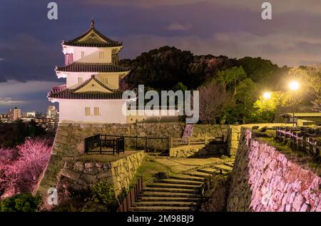 Stairs through stone walls of Akashi Castle in early evening Stock Photo