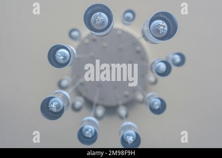 Bottom view of decorative lamp in apartment. Stock Photo