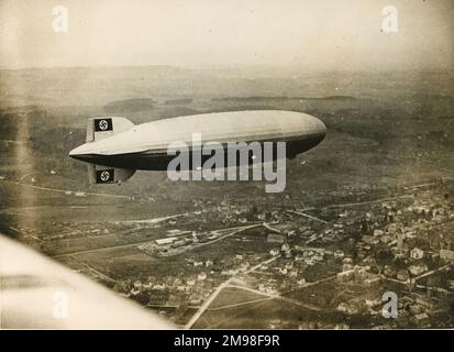 The LZ129 Hindenburg over Friedrichshafen during a test flight on 6 March 1936. Stock Photo