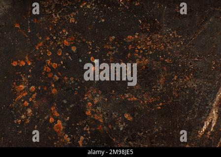 Dark abstract background with scuffs and scratches. Metal texture with rust Stock Photo