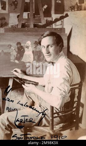 Reg Carter (1886-1949), freelance commercial artist, at work in his studio at Granville House, High Street, Southwold, Suffolk. He gave painting lessons to the young Harold Auerbach when the latter was in Southwold on holiday. Stock Photo