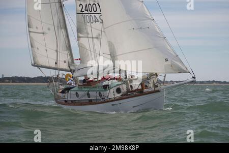 Suhaili the yacht on which Sir Robin Knox-Johnston became first person to sail around the world solo & non-stop in 1968-9. Racing at Hamble Classics. Stock Photo