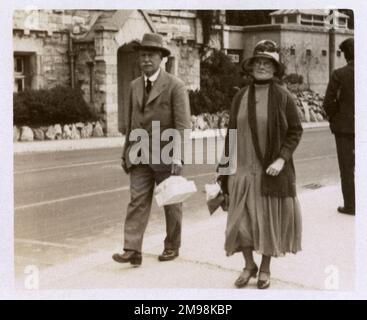 Rather serious older couple on holiday at Torquay, Devon. Stock Photo