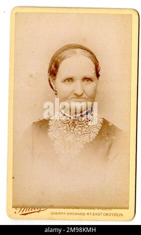Victorian woman in studio photo. Stock Photo