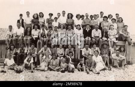 Large Group on the Beach ('New Beach') - a 'Whistle' photograph incorporating many people (unknown to each other) gathered together to be photographed by a photographer's whistle! Stock Photo