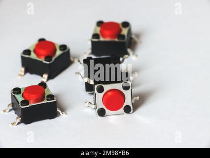 Five tact switch, red pushbutton switch Stock Photo