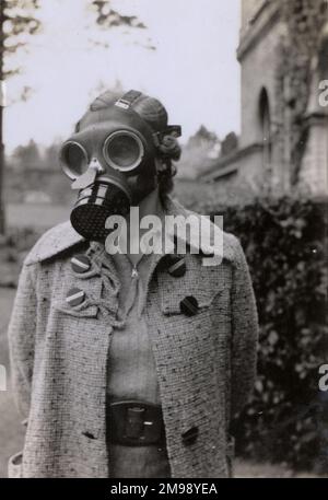 WW2 - Home Front - Woman in her Gas Mask. Stock Photo