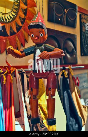 Italy, souvenir shop in Otarnto with wooden Pinocchio puppet a well known fairy tale character Stock Photo