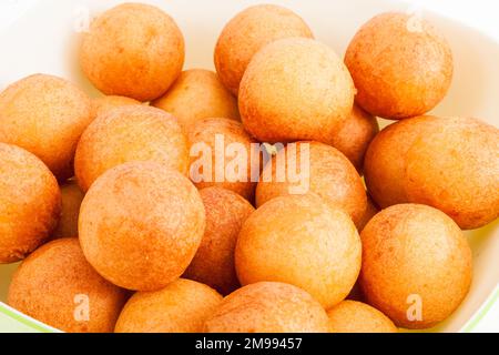 Traditional Colombian Buñuelo - Deep Fried Cheese Bread On White Background. Stock Photo