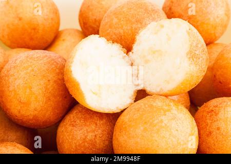 Traditional Colombian Buñuelo - Deep Fried Cheese Bread On White Background. Stock Photo