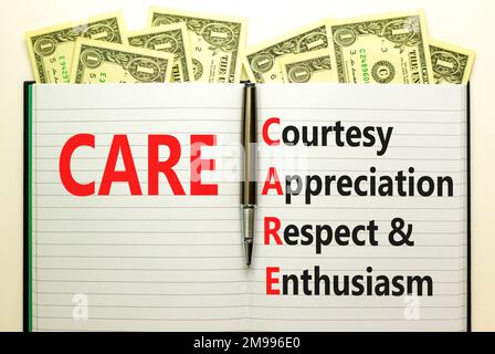 CARE symbol. Concept words CARE courtesy appreciation respect and enthusiasm on white note on beautiful white background. Business CARE courtesy appre Stock Photo